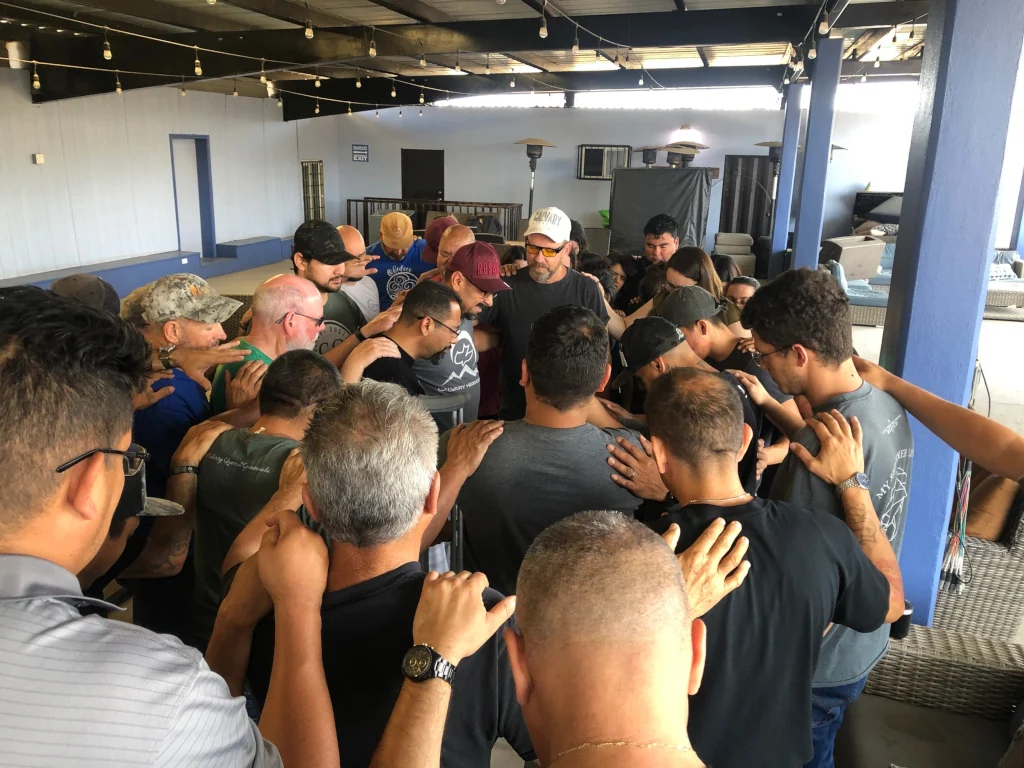 Calvary Chapel Staff praying for Jason as he goes out to being this great ministry.